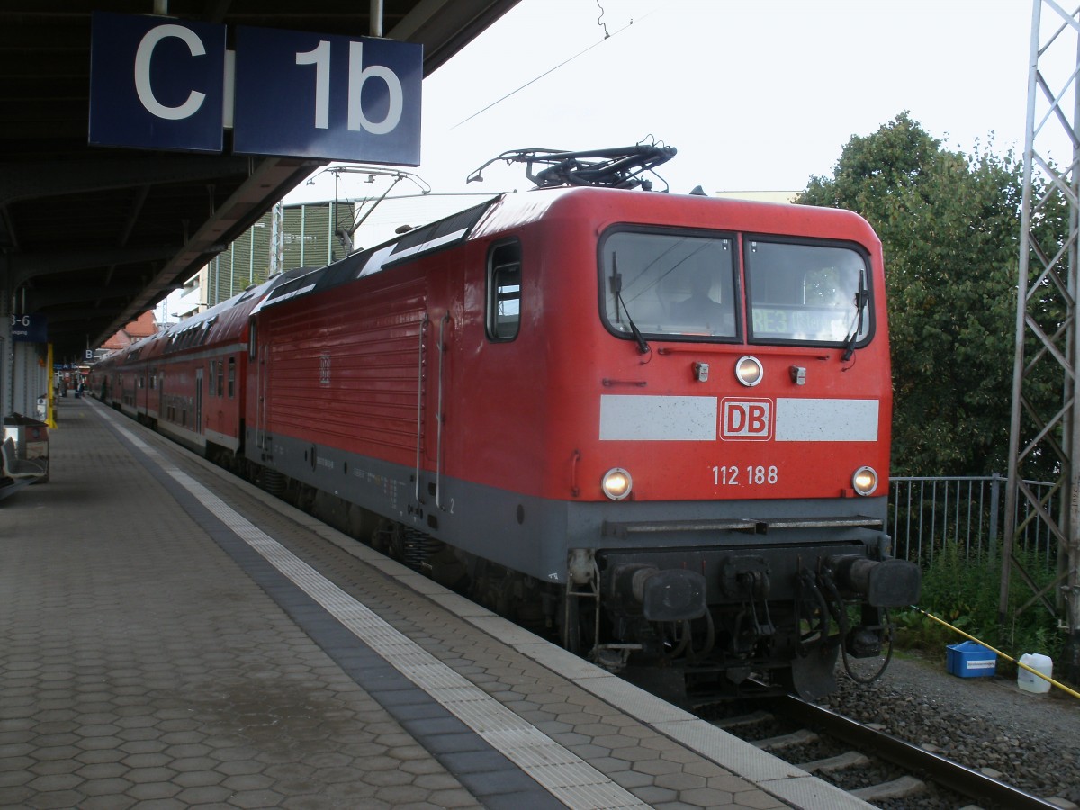 RE 18313 Stralsund-Elsterwerda vor der Abfahrt,am 19.September 2013,in Stralsund der von der Cottbuser 112 188 gezogen wurde.