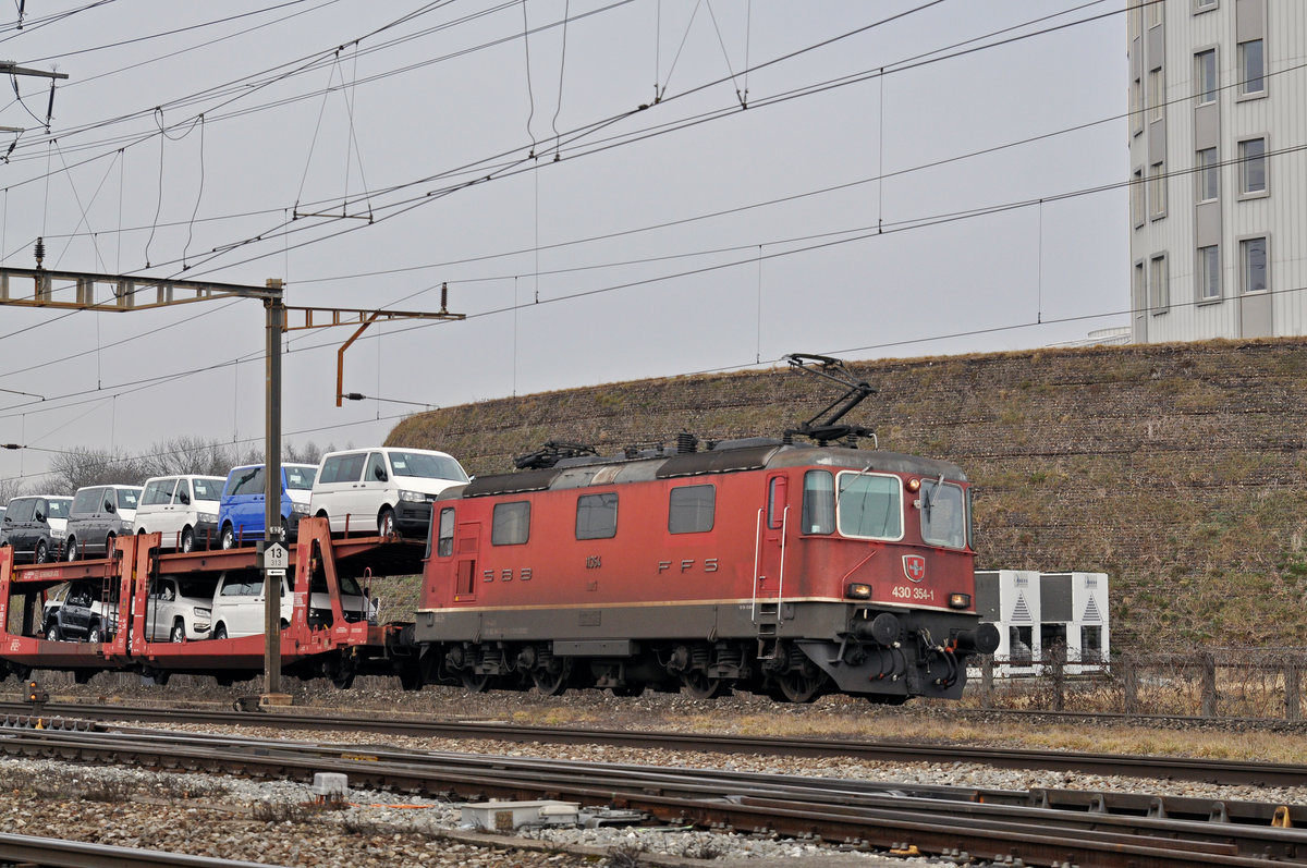 Re 430 354-1 (11354) durchfährt den Bahnhof Pratteln. Die Aufnahme stammt vom 07.02.2017.