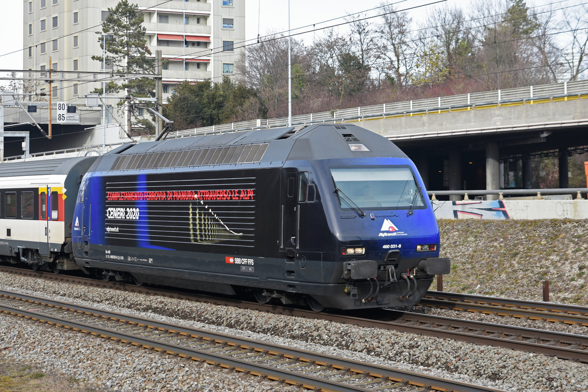 Re 460 031-8 mit der Werbung für den Ceneri 2020, fährt Richtung Bahnhof Muttenz. Die Aufnahme stammt vom 08.02.2019.