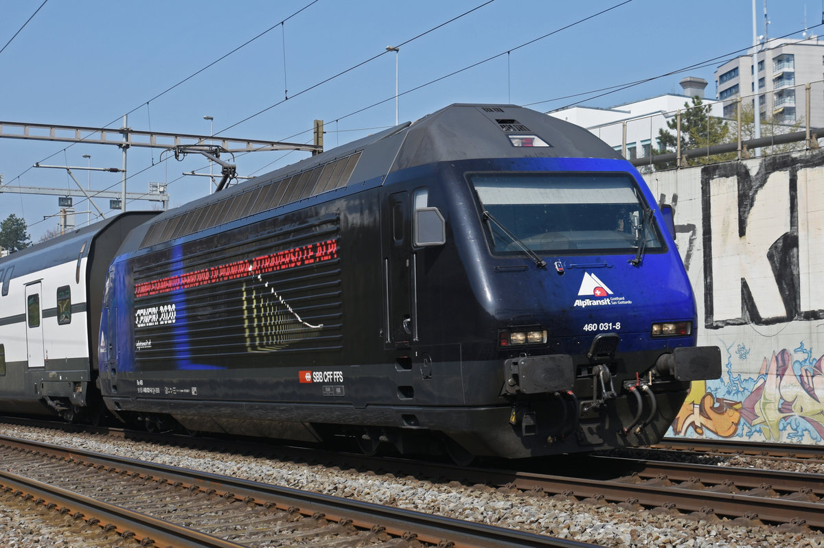 Re 460 031-8 mit der Werbung für den Ceneri 2020, fährt Richtung Bahnhof Muttenz. Die Aufnahme stammt vom 24.03.2019.