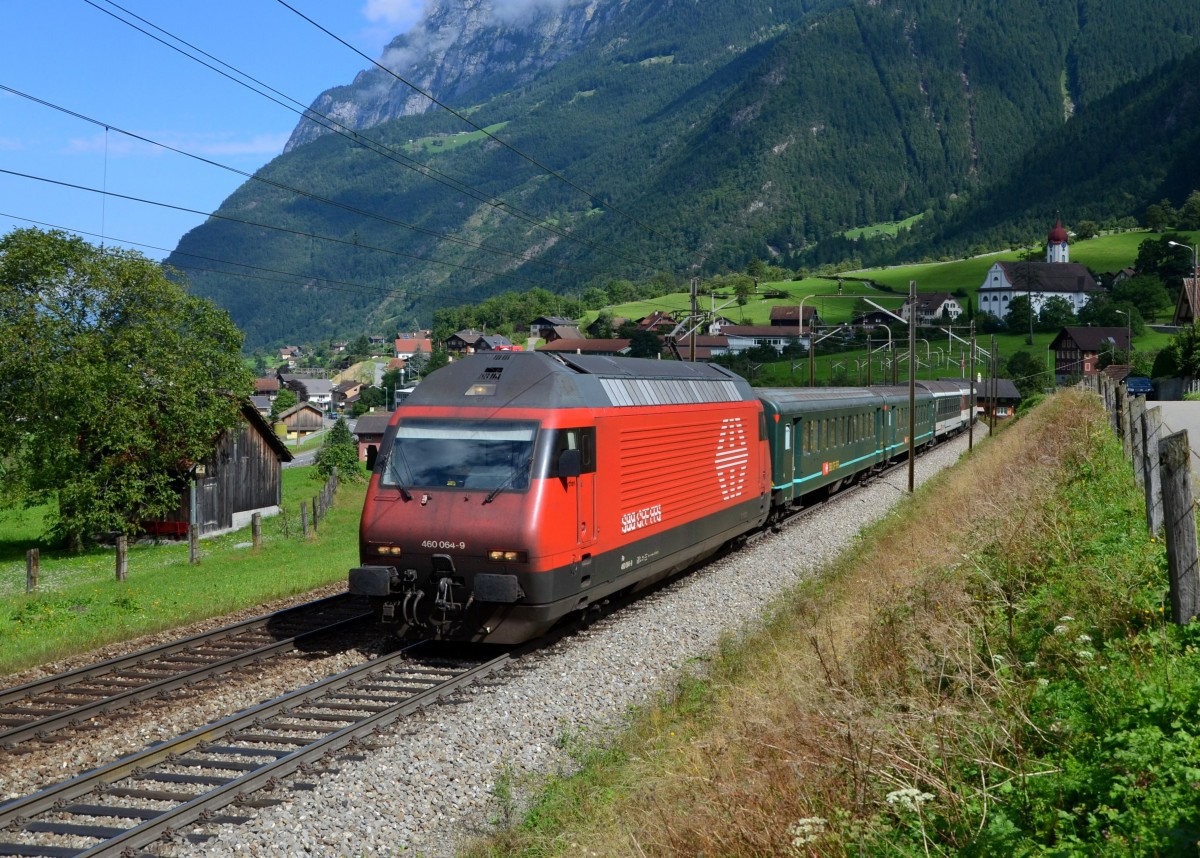Re 460 064 mit einem IR nach Locarno am 29.08.2013 bei Amsteg-Silenen.