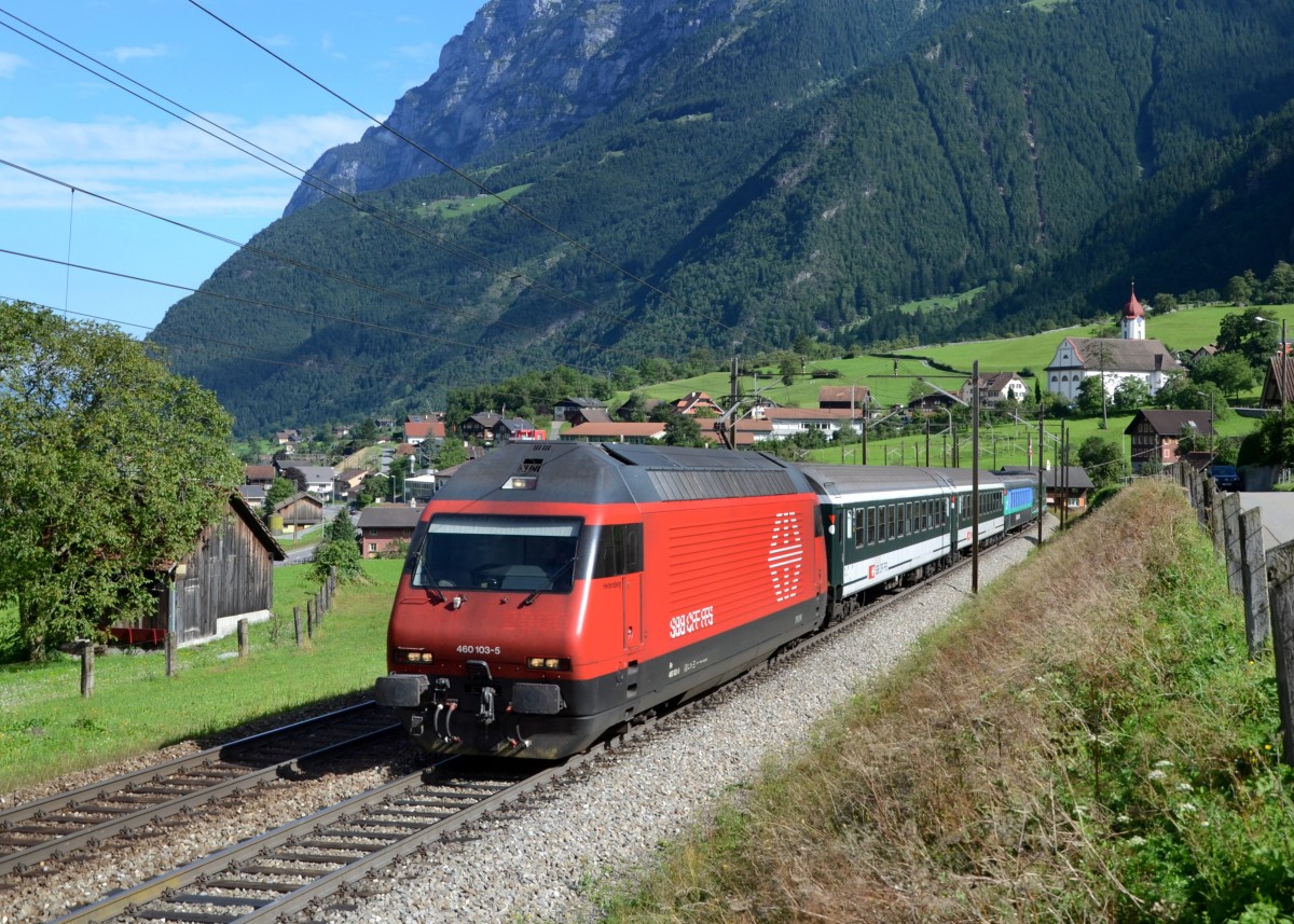 Re 460 103 mit einem IR nach Locarno am 29.08.2013 bei Amsteg-Silenen.