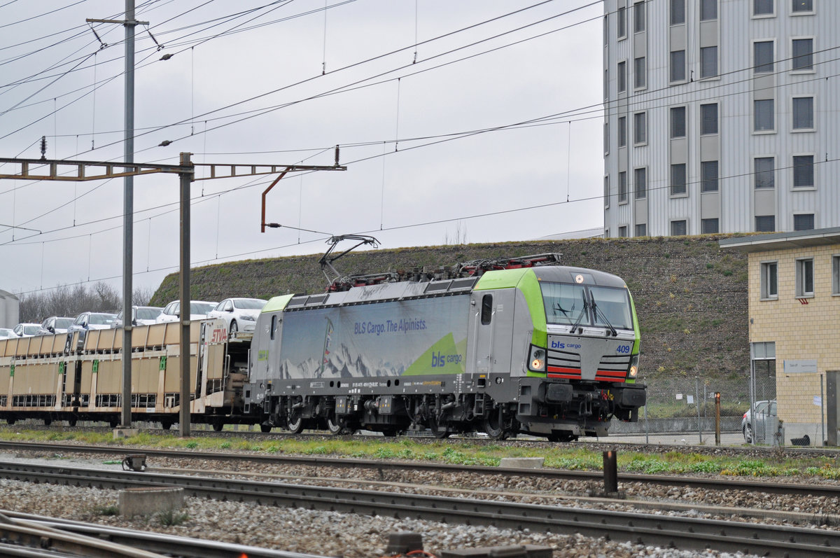 Re 475 409-9 durchfährt den Bahnhof Pratteln. Die Aufnahme stammt vom 07.01.2018.