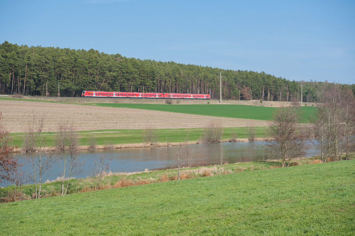 RE 58220 von Nürnberg Hbf nach Würzburg Hbf bei Neustadt a. Aisch, 30.03.2019