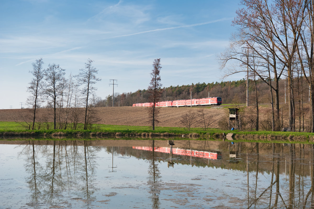 RE 58223 von Würzburg Hbf nach Nürnberg Hbf kurz vor Neustadt a. Aisch, 30.03.2019