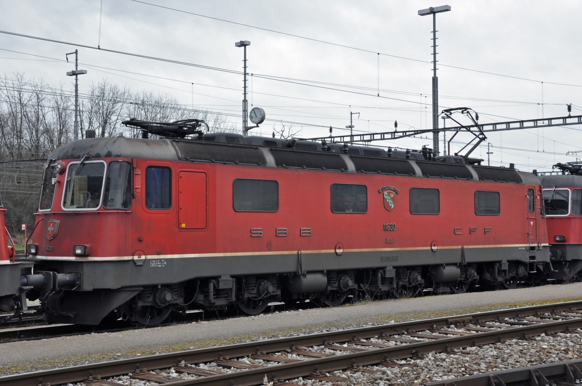 Re 6/6 11630 am Güterbahnhof in Muttenz. Die Aufnahme stammt vom 15.02.2014.