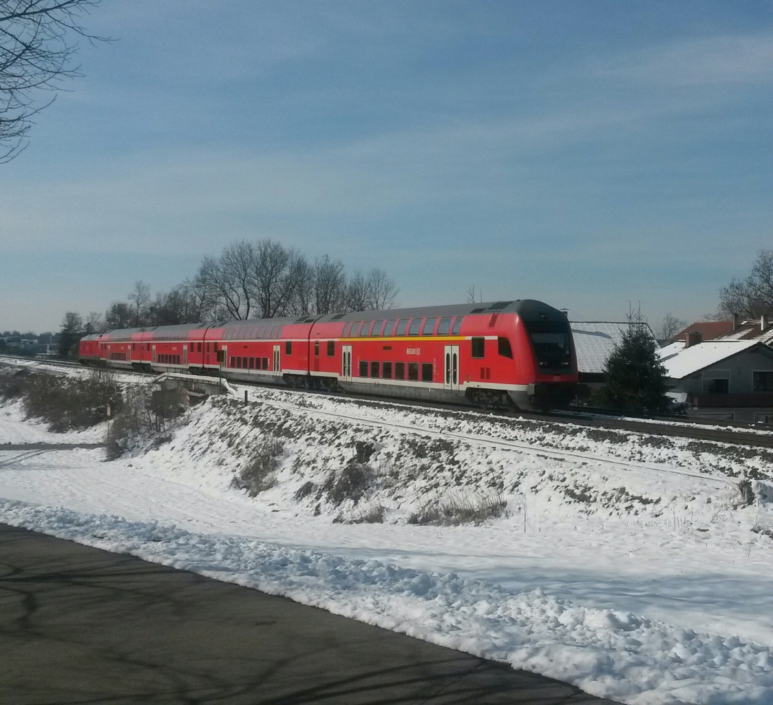 RE Füssen - München am 26.02.2016 kurz nach überqueren der Lechbrücke in Kaufering.