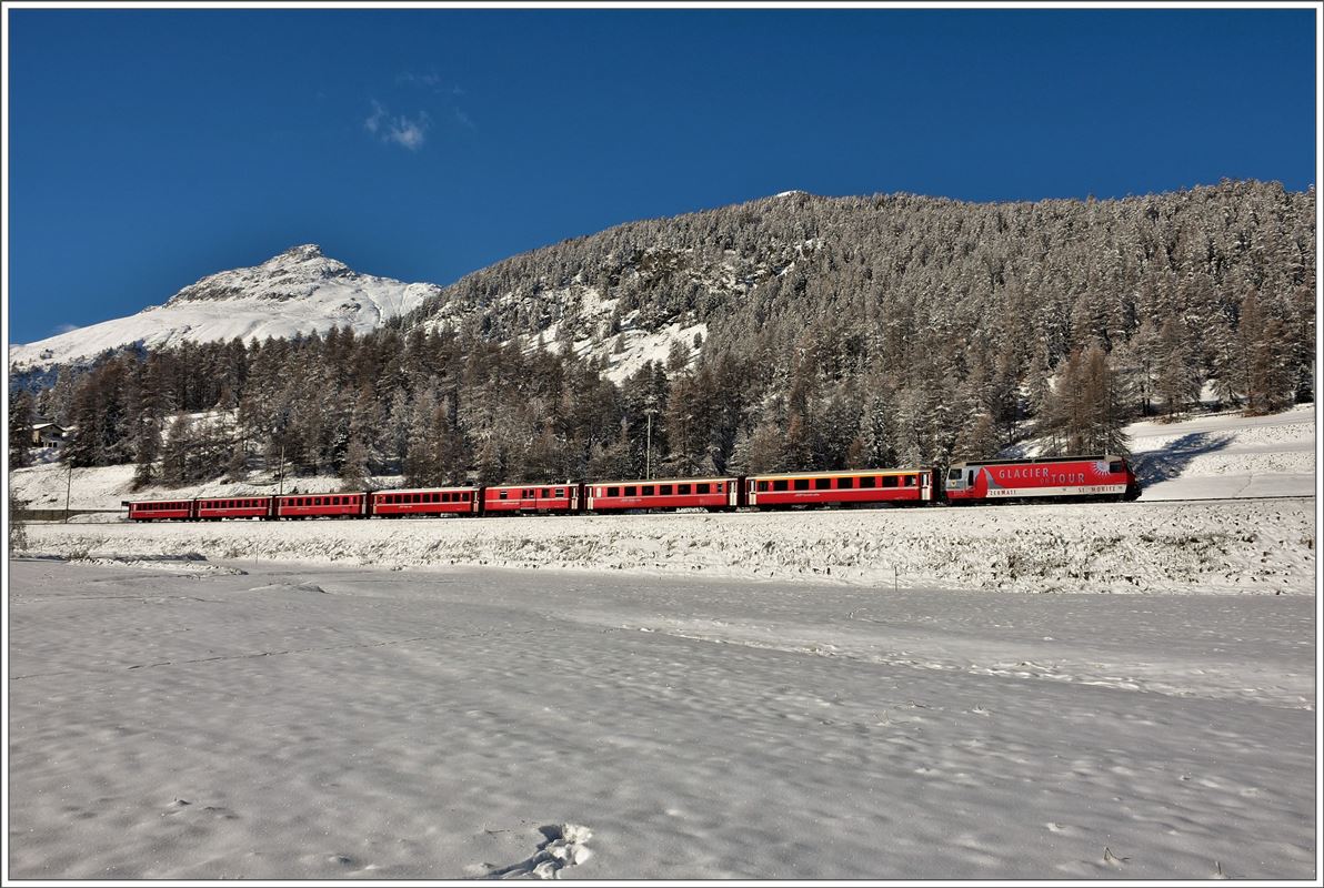 RE1136 nach Chur mit Ge 4/4 III 651  Fideris  zwischen Samedan und Bever. (08.11.2016)