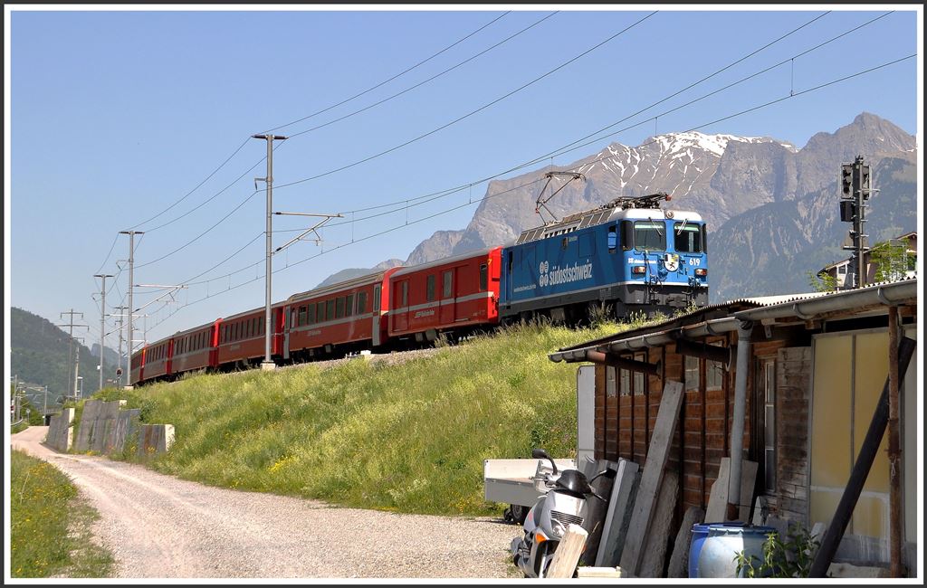 RE1232 mit Ge 4/4 II 619  Samedan  bei Zizers. (13.05.2015)