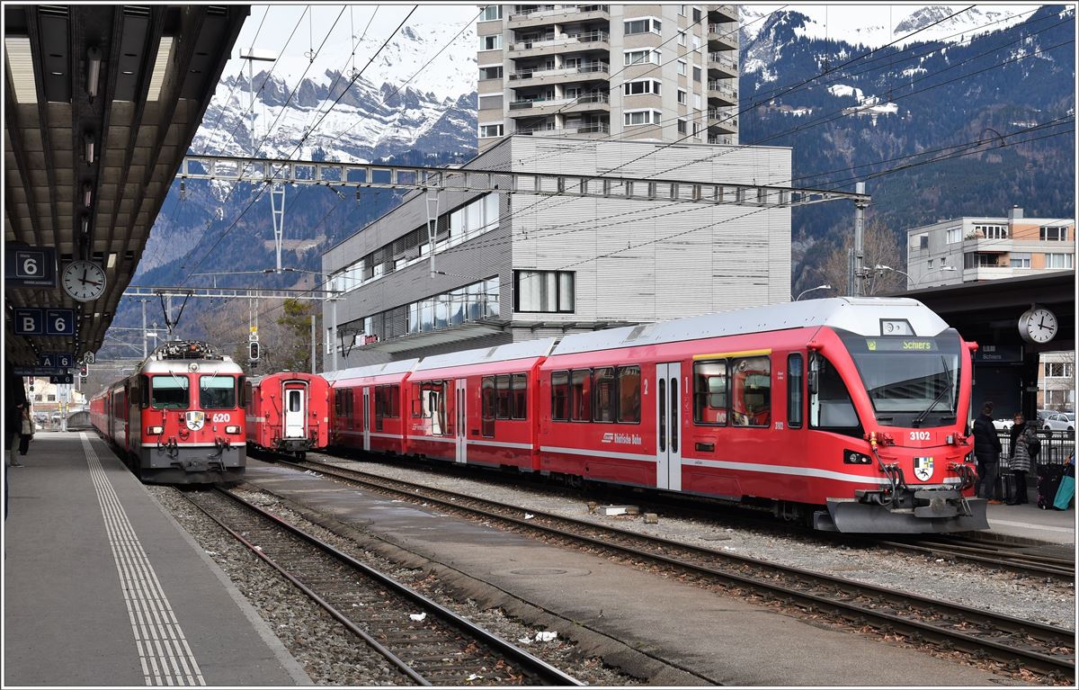 RE1232 mit Ge 4/4 II 620  Zernez  und S1 1512 mit ABe 4/16 3102 in Landquart. (04.02.2017)