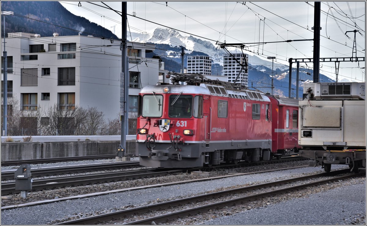 RE1724 von Disentis mit Ge 474 II 631  Untervaz  in Chur Gbf. (08.12.2019)