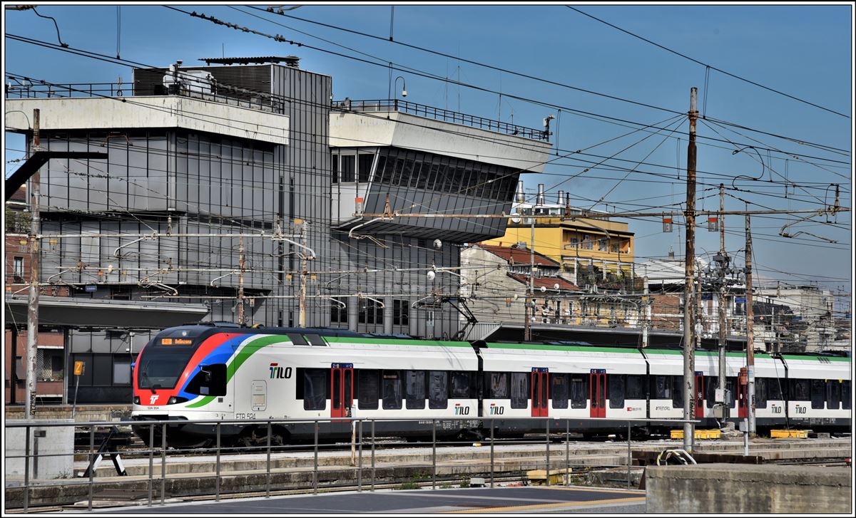 RE25518 nach Erstfeld mit 524 204 verlässt Milano Centrale. (21.02.2020)