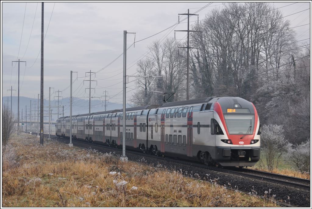 RE3822 nach St.Gallen mit 511 015 bei Rüthi SG. (18.12.2013)
