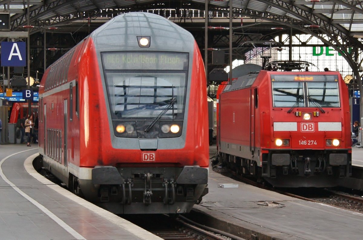 RE6 (RE10628)  Westfalen-Express  von Minden(Westf) nach Köln/Bonn Flughafen trifft am 25.05.2019 im Kölner Hauptbahnhof auf 146 274 mit dem RE1 (RE10137)  Nordrhein-Westfalen-Express  von Aachen Hauptbahnhof nach Hamm(Westf). 