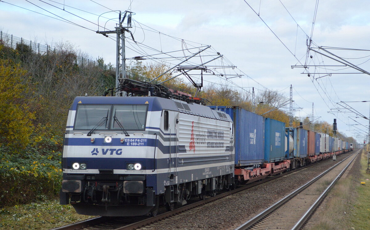 Retrack GmbH & Co. KG, Hamburg [D] mit MRCE Dispo  ES 64 F4-211  [NVR-Nummer: 91 80 6189 211-6 D-DISPO] und KLV-Zug am 09.11.21 Durchfahrt Bf. Berlin Hohenschönhausen.