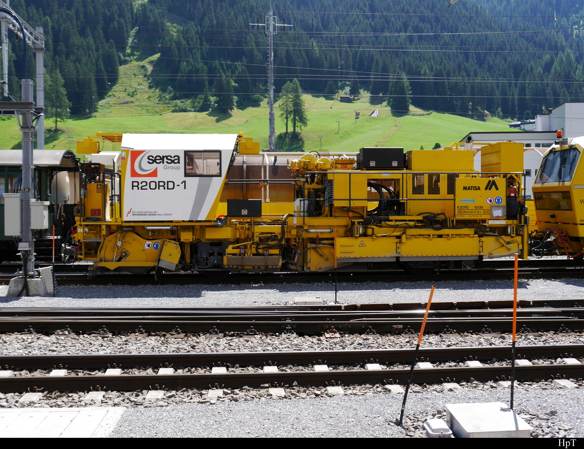 RhB / Sersa - Krampmaschine R 20 RD-1 abgestellt in Davos Platz am 30.07.2018