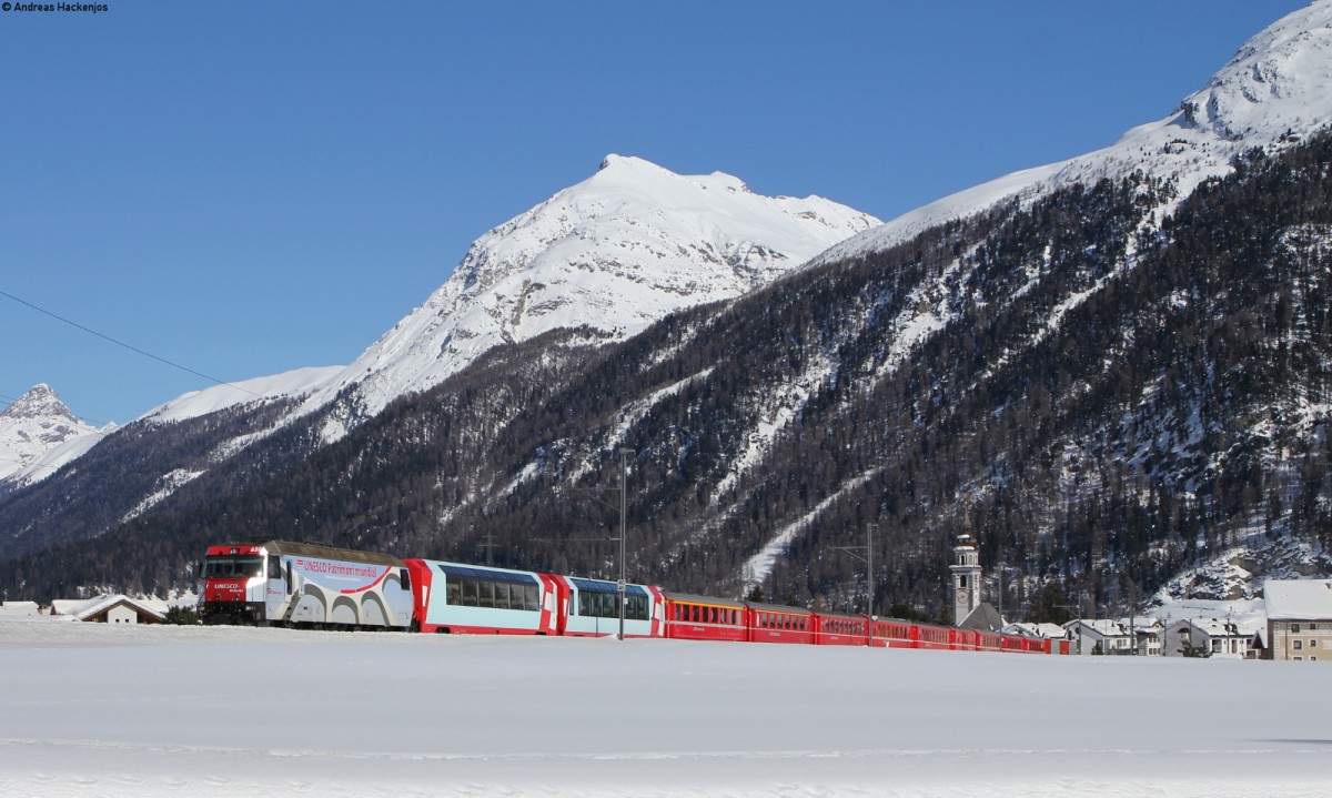 Rhb 650  Unesco Welterbe  mit dem RE 1148 (St. Moritz-Chur) bei Bever 8.3.14
