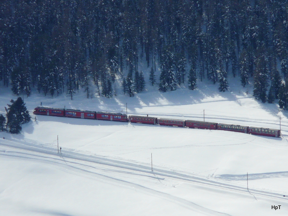 RhB - ABe 8/12 mit 5 Personenwagen kurz vor Pontresina am 15.02.2014