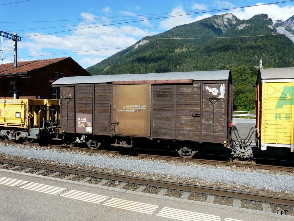 RhB - Gepckwagen D 4078 im Bahnhof Reichenau-Tamins am 20.09.2013