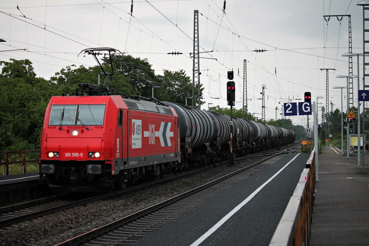 RheinCargo 185 589-9  MEV  am 30.07.2014 mit einem Kesselwagenzug in Müllheim (Baden) gen Freiburg.