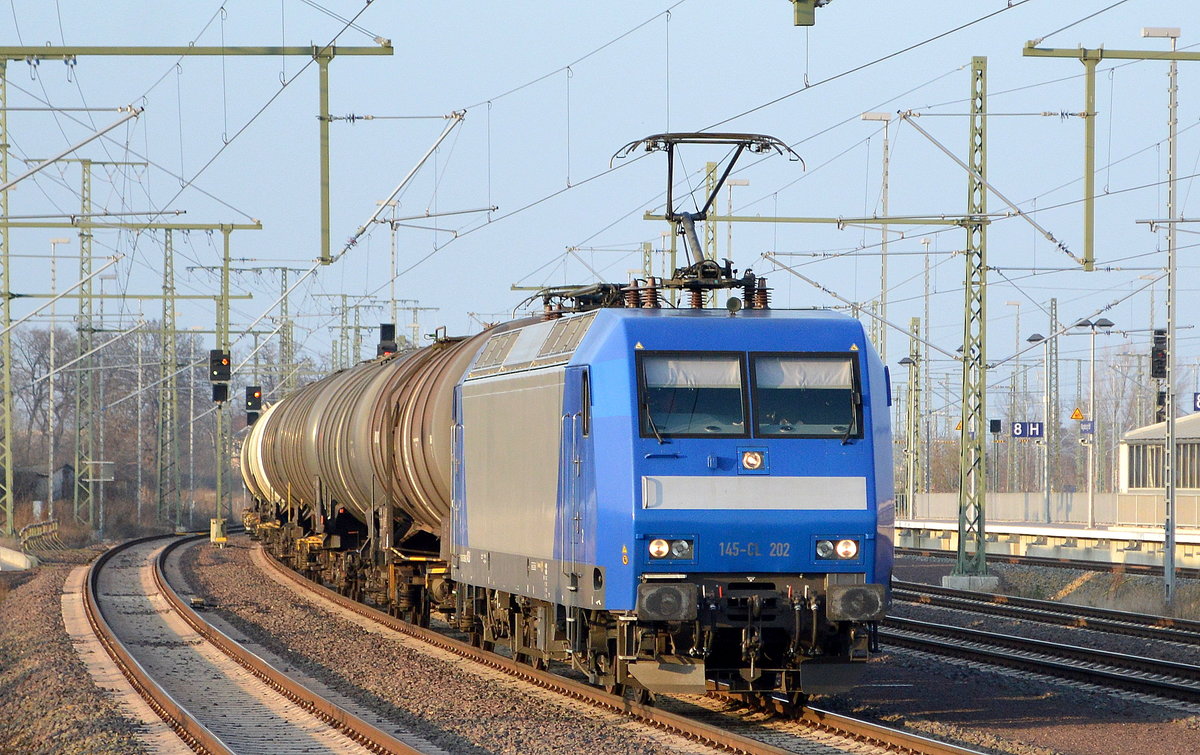 RheinCargo GmbH & Co. KG mit  145-CL 202  [NVR-Number: 91 80 6145 098-0 D-RHC] und Kesselwagenzug am 21.03.19 Durchfahrt Magdeburg Hbf.