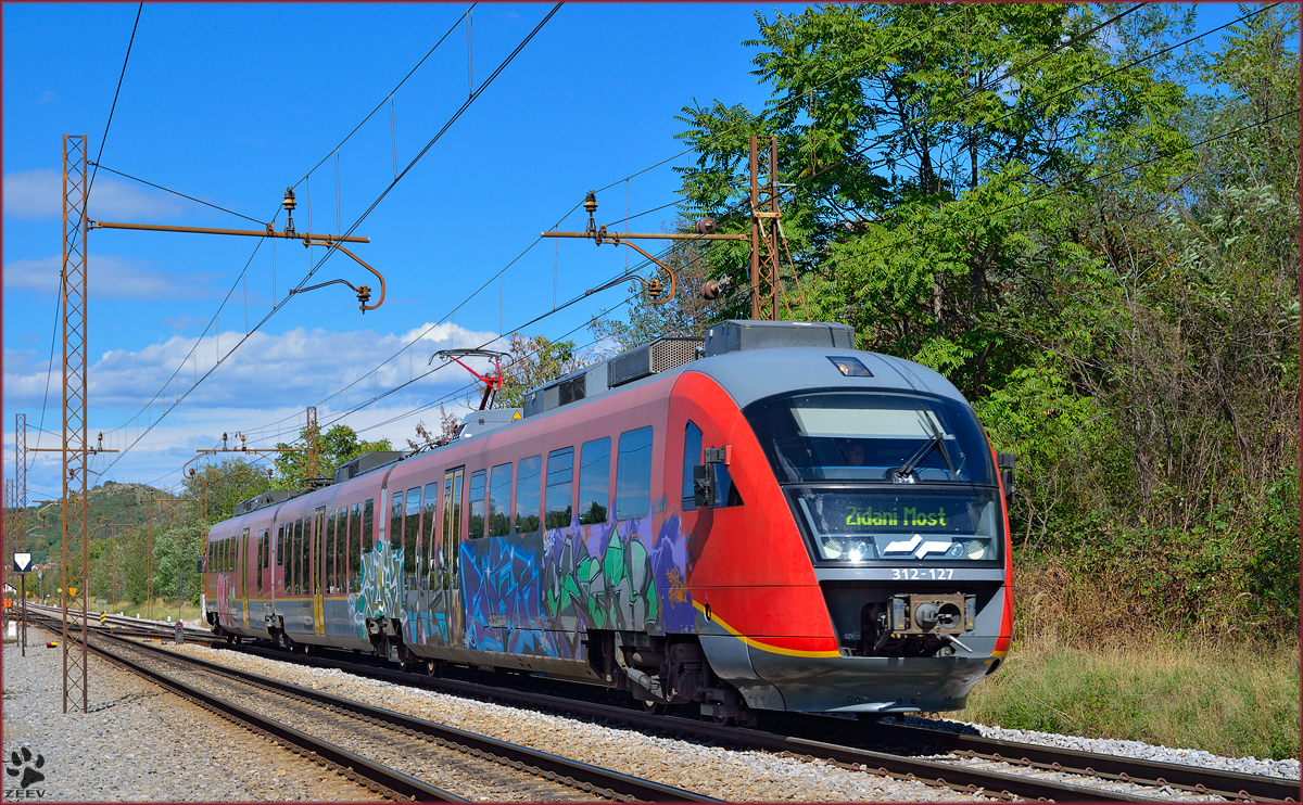 S 312-127 fhrt durch Maribor-Tabor Richtung Zidani Most. /14.9.2013