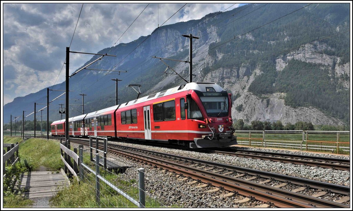 S1 1519 nach Chur mit ABe 4/16 3105 zwischen Felsberg und Chur West. (28.07.2020)