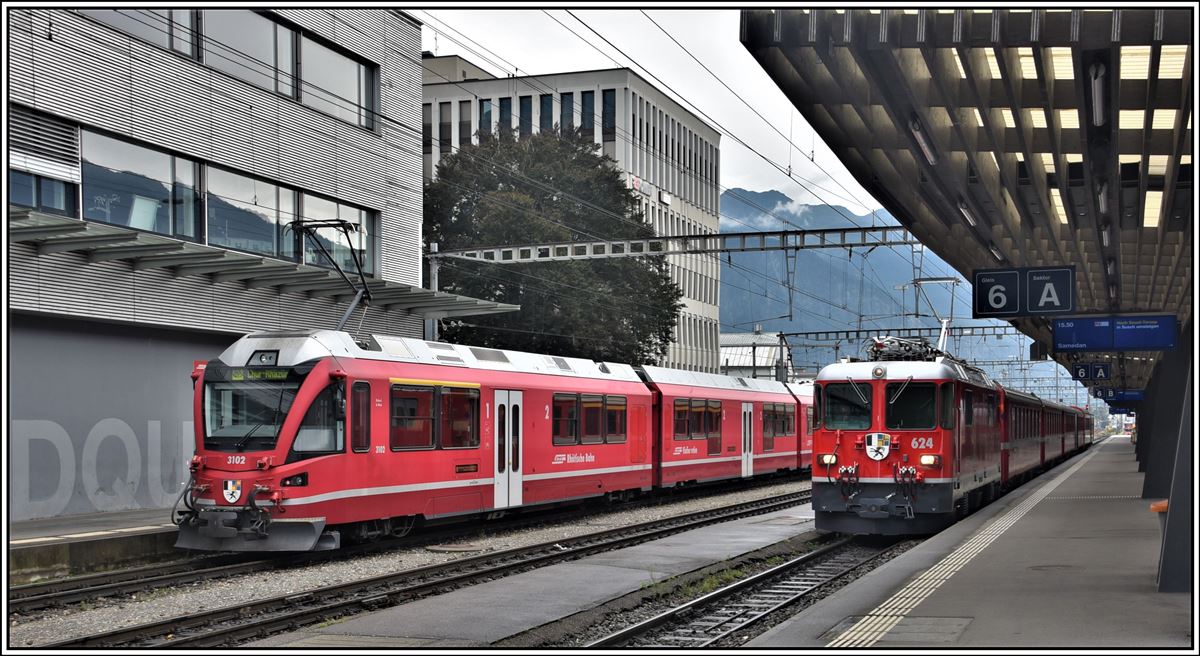 S1 1525 mit ABe 4/16 3102 und RE1353 mit Ge 4/4 II 624  Celerina/Schlarigna  in Landquart. (29.08.2019)