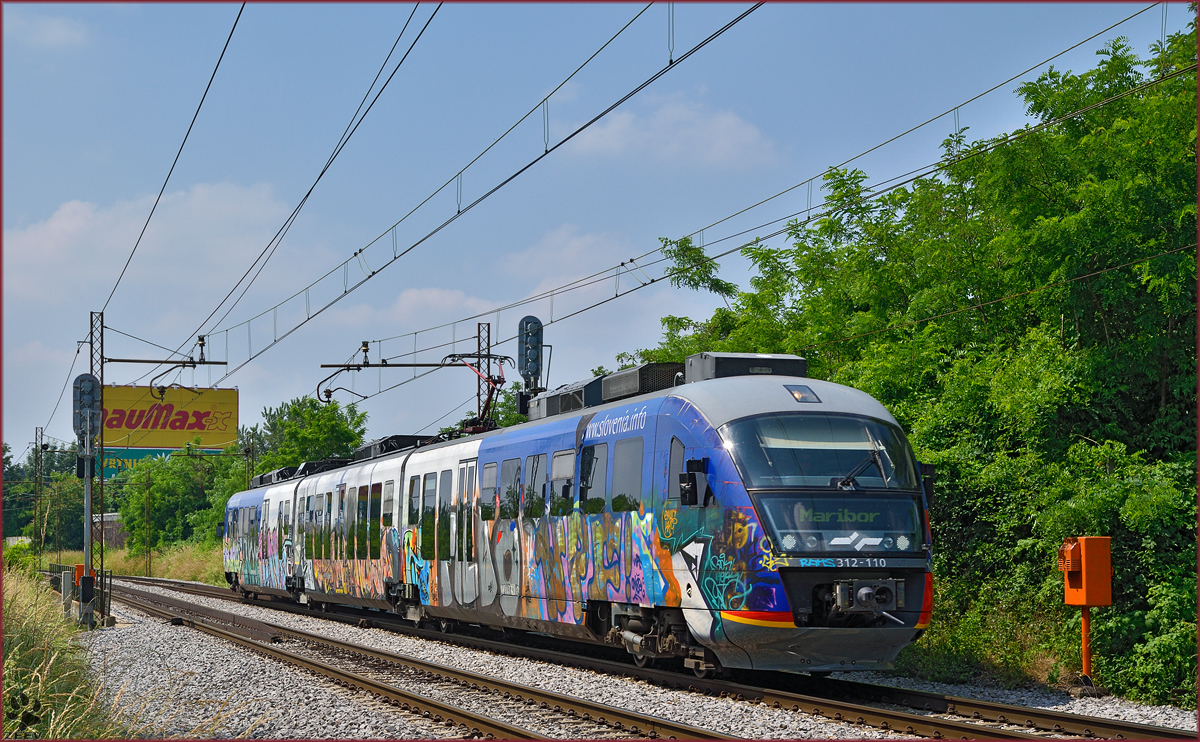 SŽ 312-110 fährt durch Maribor-Tabor Richtung Maribor HBF. /9.6.2015