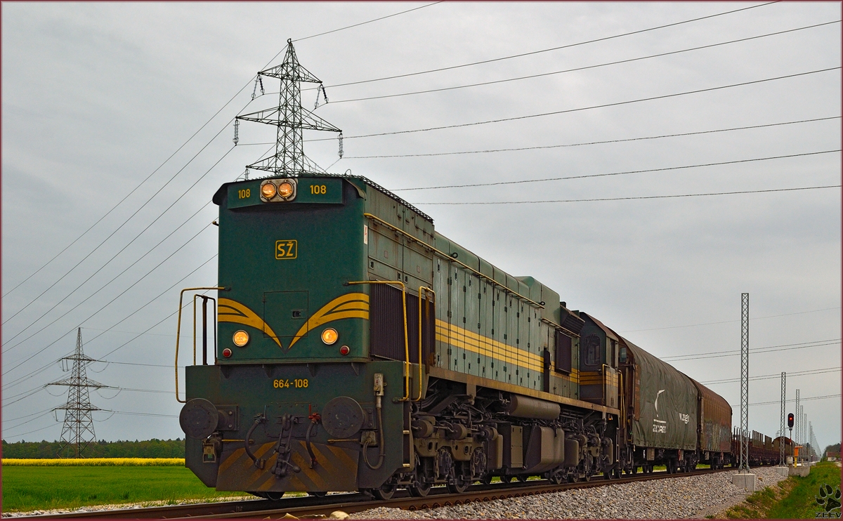 SŽ 664-108 zieht Güterzug durch Cirkovce Richtung Koper Hafen. /17.4.2014