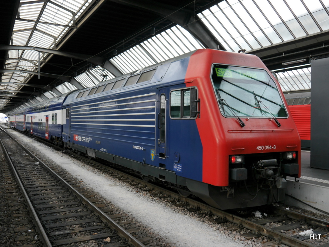 SBB - 450 094-8 unterwegs auf der S 25 im HB Zürich am 31.01.2015