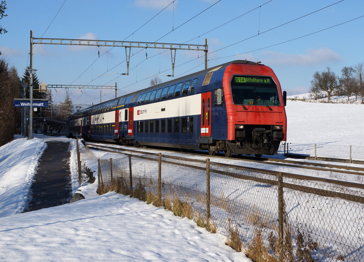 SBB: Die S14 mit einer Komposition der Baureihe Re 450 bei der Einfahrt in den Bahnhof Urdorf Weihermatt am 6. Januar 2017.
Foto: Walter Ruetsch