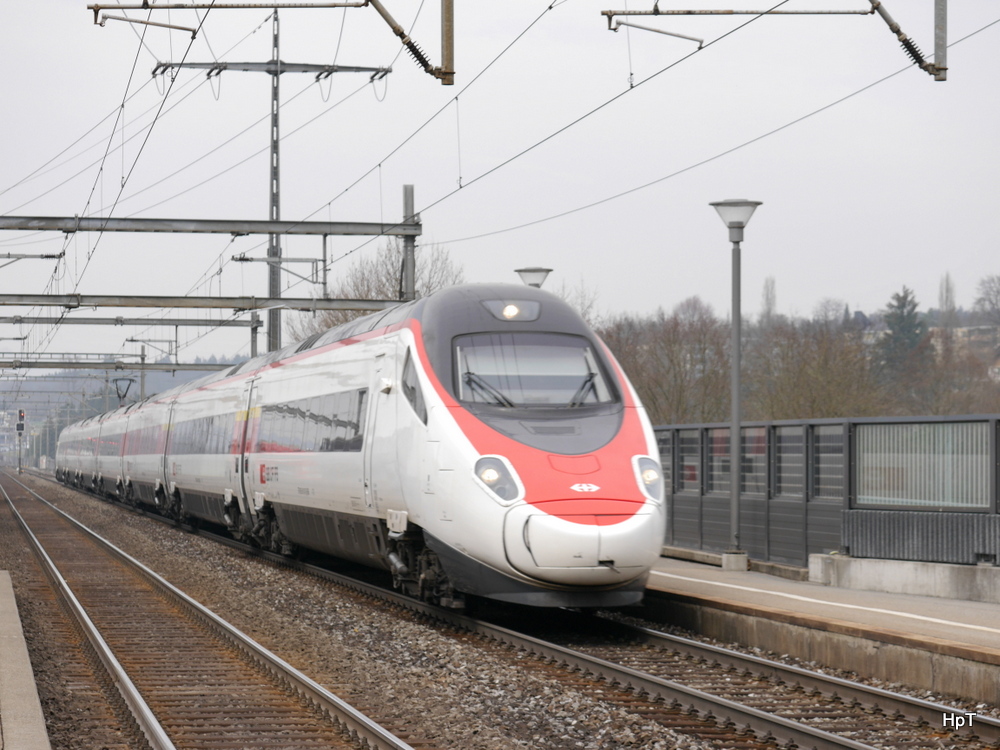 SBB - ein ETR 610 bei der durchfahrt im Bahnhof Münsigen am 15.03.2014