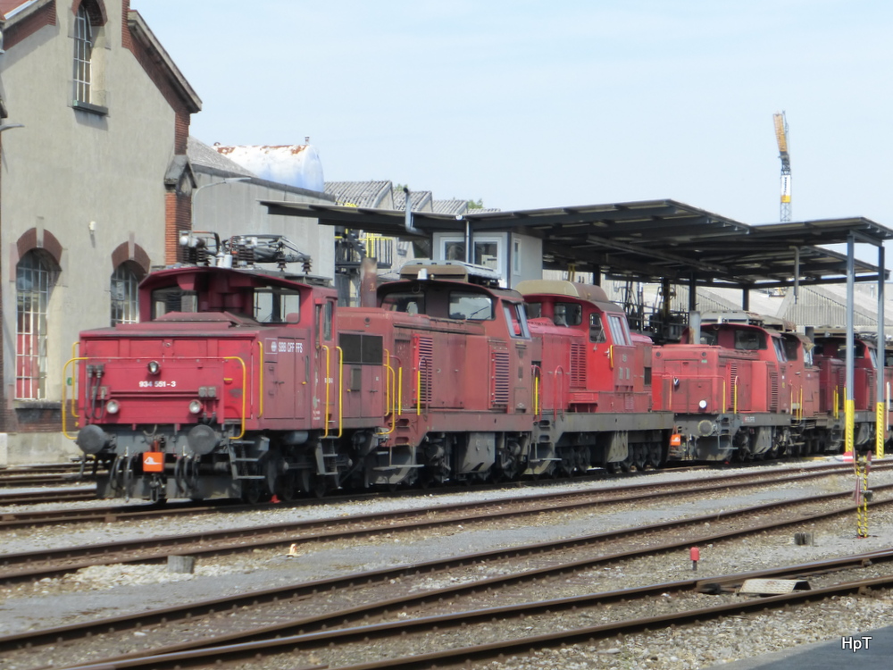 SBB - Lokparade in der IW Biel an Erster Stelle die Rangierlok Ee 3/ 934 551-3 ..Foto vom 10.08.2014 .. Standort des Fotografen ausserhalb der IW Biel 