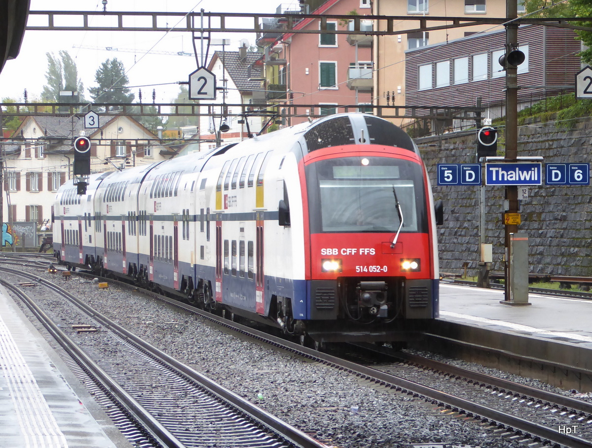 SBB - RABe 514 052-0 unterwegs bei Regen bei der einfahrt im Bahnhof Thalwil am 14.09.2017