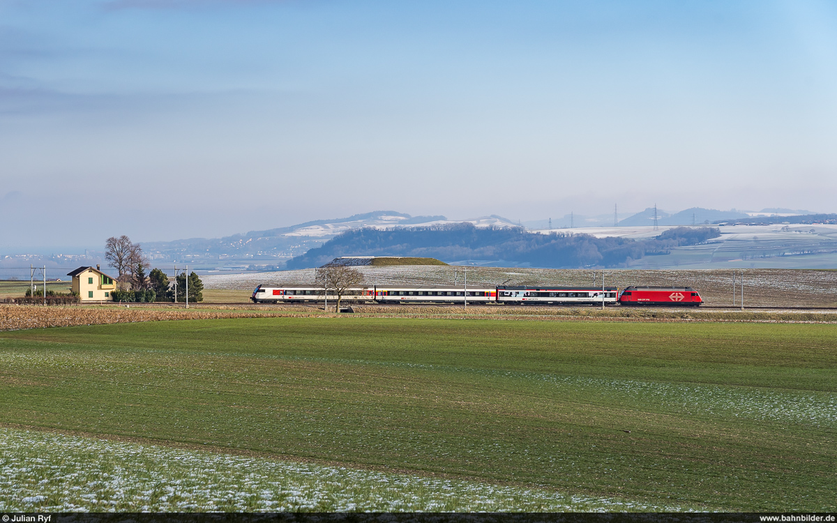 SBB Re 460 / Arnex-sur-Orbe, 20. Januar 2024<br>
Fahrleitungs-Messfahrten mit Stromversorgung der Lokomotive über den Stromabnehmer des gezogenen Diagnosefahrzeugs.