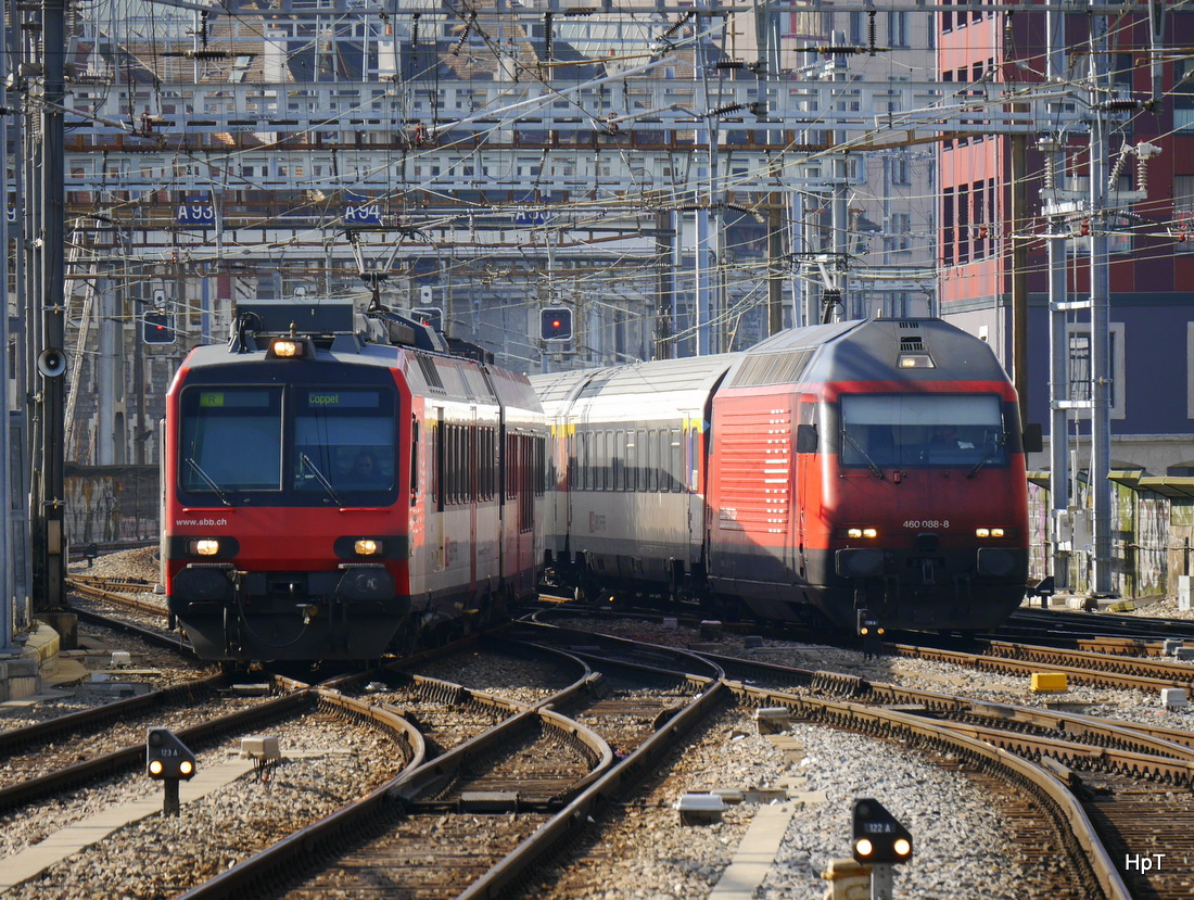 SBB - Regio und RE bei der einfahrt im Bahnhof Genf am 08.03.2015