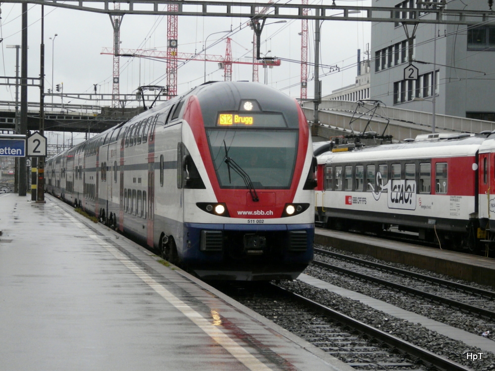 SBB - Triebzug RABe 511 002-3 unterwegs auf der S12 im Bahnhof Zrich Altsetten am 16.09.2013