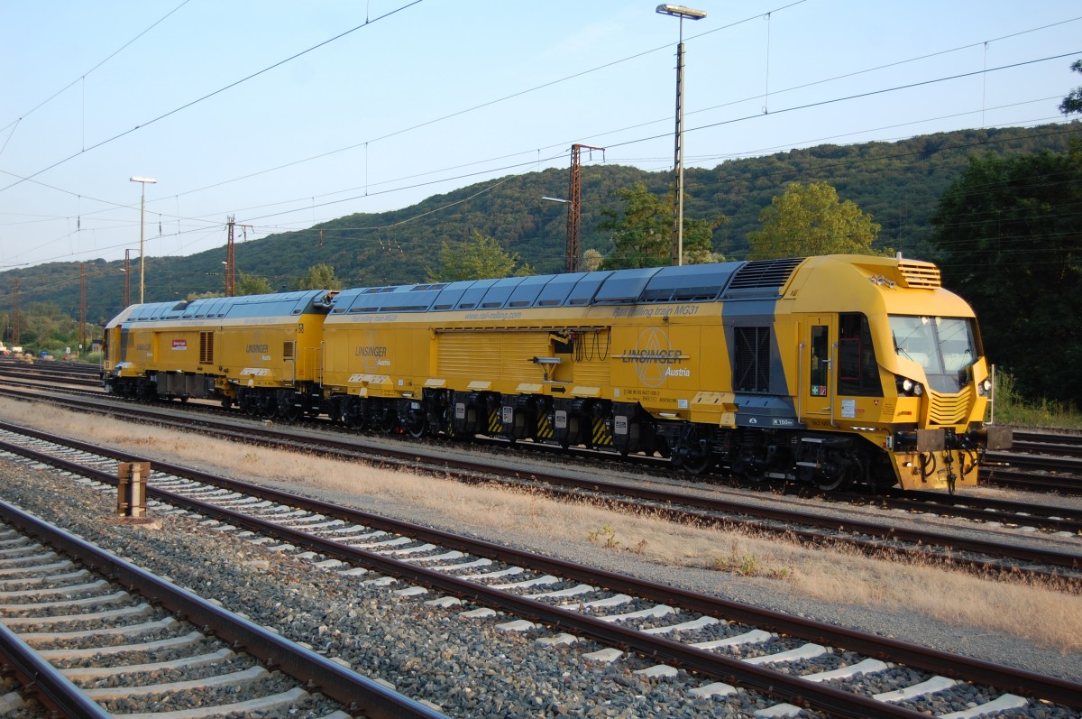 Schienen-Frmaschine MG31 der Deutschen Bahn AG, gebaut von der Firma Linsinger auf einer berfhrungsfahrt in Gemnden. Aufnahme vom 12. Juli 2013.