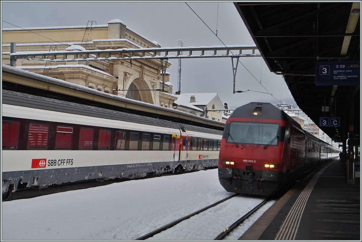 Schnee - und die Züge verkehren erfreulicherweise (fast) pünktlikch!
SBB Re 460 043-3 mit ihrem IR Genève-Aeroport - Brig in Vevey. 
2. Februar 2015