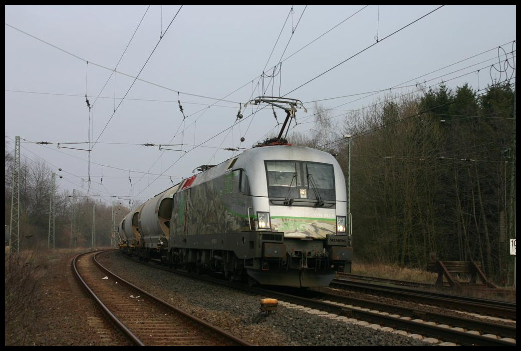 SETG Taurus 1116.912-5 verlässt hier gerade am 28.3.2005 mit einem Ganz Zug in Richtung Münster den Bahnhof Hasbergen.