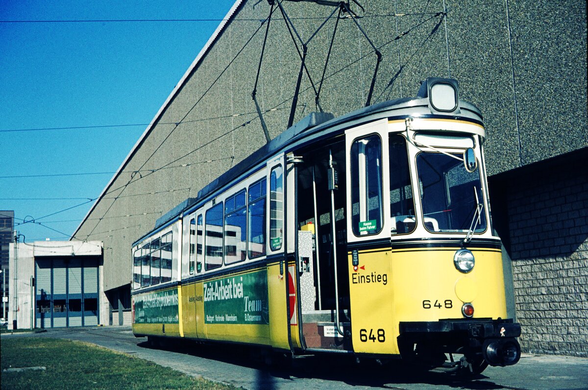 SSB Stuttgart__In der Hw in S-Möhringen. GT4 648 [ME; 1963] umgerüstet zum dauerhaften Bei-Tw. 1992 nach Halberstadt, als Tw 153 dort 2003 verschrottet.__26-02-1975