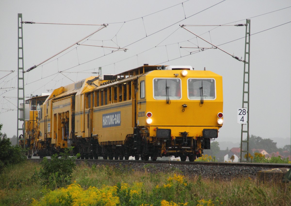 Stopfexpress 09-3X Hartung Bau bei Reundorf im Regen am 18.08.2014.