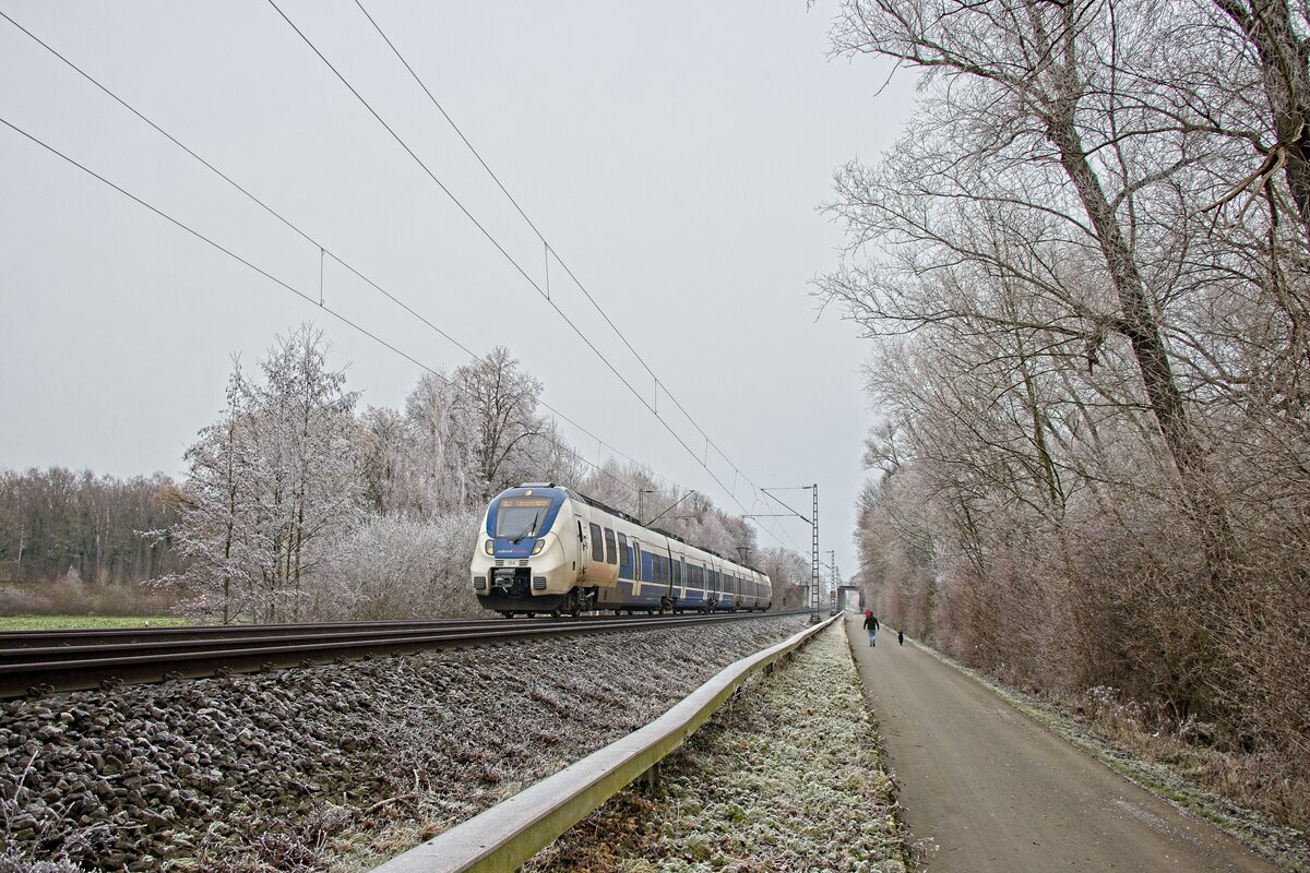 Talent 354 der National Express als verkürzter RE 7 bei Unna-Mühlhausen (23.12.2021)