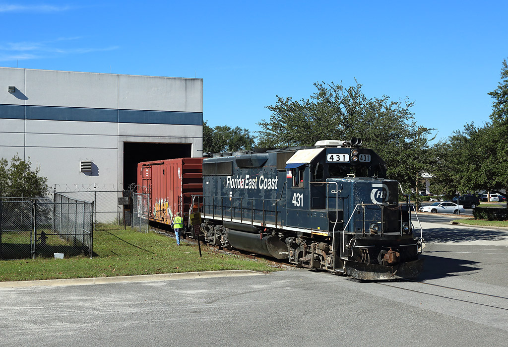 The Jacksonville Local, FEC 905 pushes box cars in to Saddle Creek Logistics near Jacksonville, 27 Nov 2018...