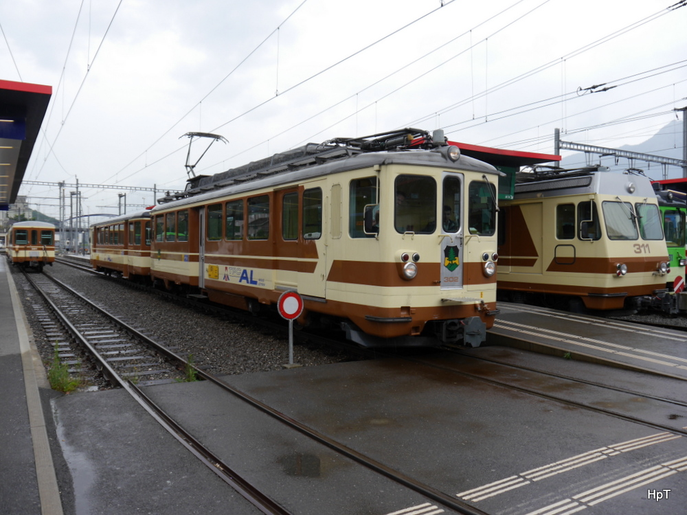 tpc / AL - Triebwagen BDeh 4/4 302 neben BDeh 4/4 311 im Bahnhofsareal in Aigle am 20.07.2014