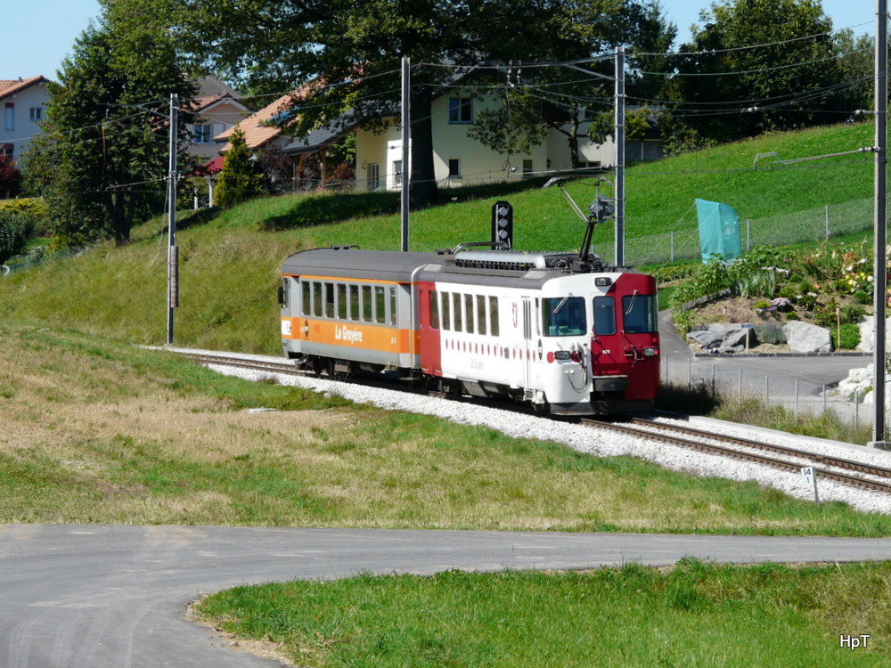 tpf - Regio mit dem Triebwagen Be 4/4 151 und Steuerwagen  Bt 253 unterwegs bei Valruz Sd am 03.09.2013
