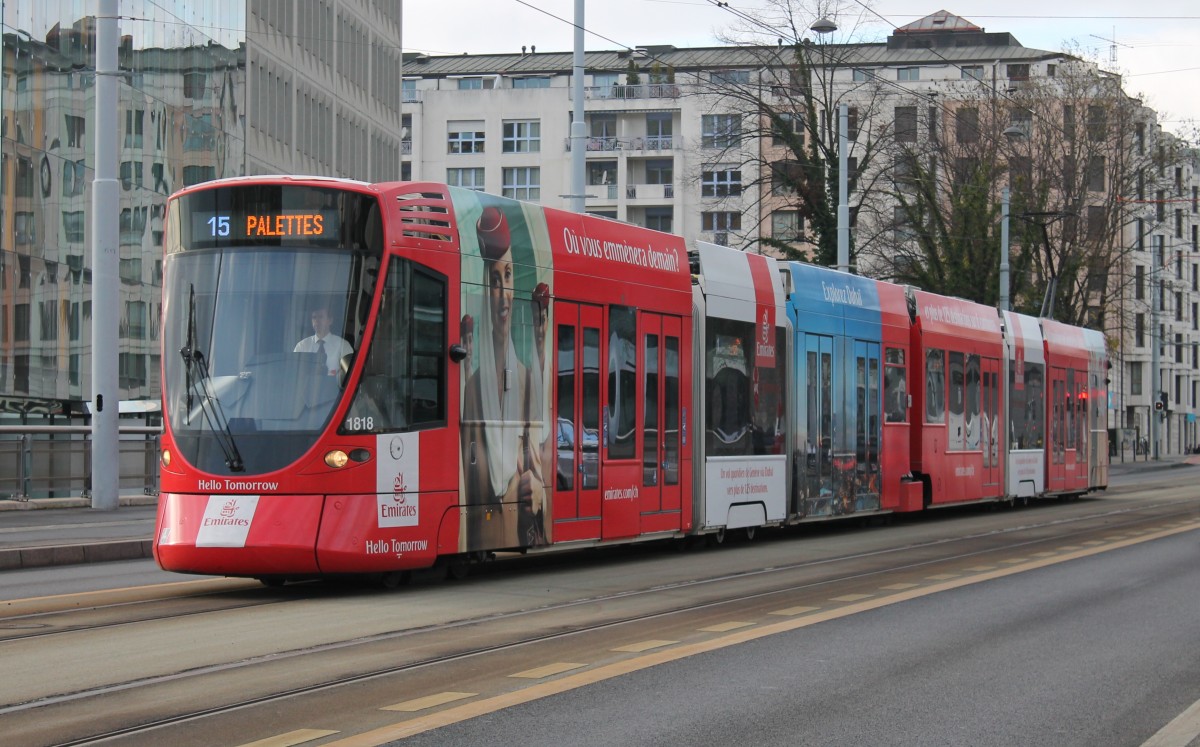 TPG STADLER TANGO 1818 mit Emirates-Werbung unterwegs zwischen den Haltestellen Sismondi und France. 06.12.2013