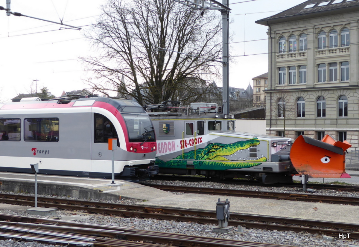 travys ( YSteC ) - Triebwagen Be 4/4 3001 mit Güterlok Ge 4/4  21 in Yverdon am 18.02.2016