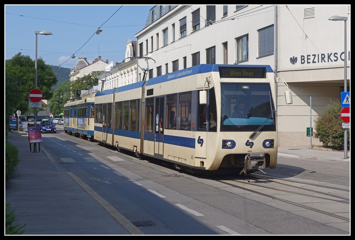 Triebwagen 409 in Baden, Kaiser Franz Josef Ring am 28.08.2018.